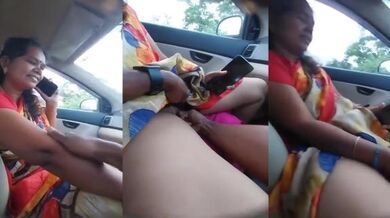 Horny Tamil aunty pussy fingered in car by Bf while on call