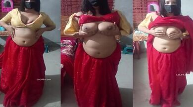 Horny Kanpur bhabhi in red saree pressing big boobs nude mms