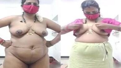 Chubby Tamil aunty wears blouse after showing saggy boobs