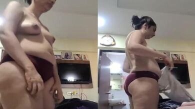 Hubby secretly records hot wife changing clothes in bedroom