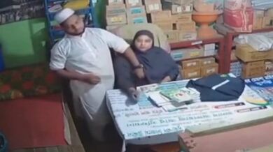 Muslim worker gropes Tamil shopowner's boobs in burqa CCTV
