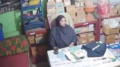 Muslim worker gropes Tamil shopowner's boobs in burqa CCTV