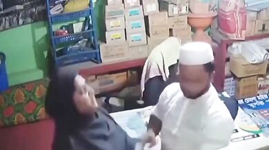 Muslim worker gropes Tamil shopowner's boobs in burqa CCTV