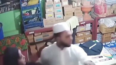 Muslim worker gropes Tamil shopowner's boobs in burqa CCTV