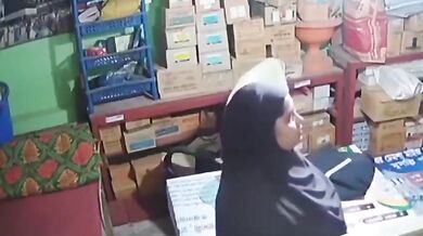 Muslim worker gropes Tamil shopowner's boobs in burqa CCTV